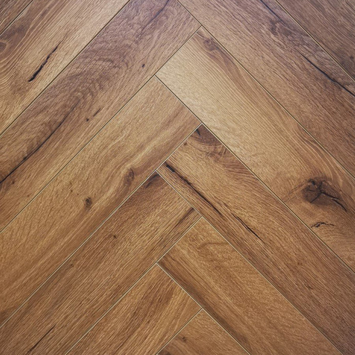 Elevate Your Space with 12mm Smoked Oak Herringbone Flooring: A Timeless Aesthetic Choice